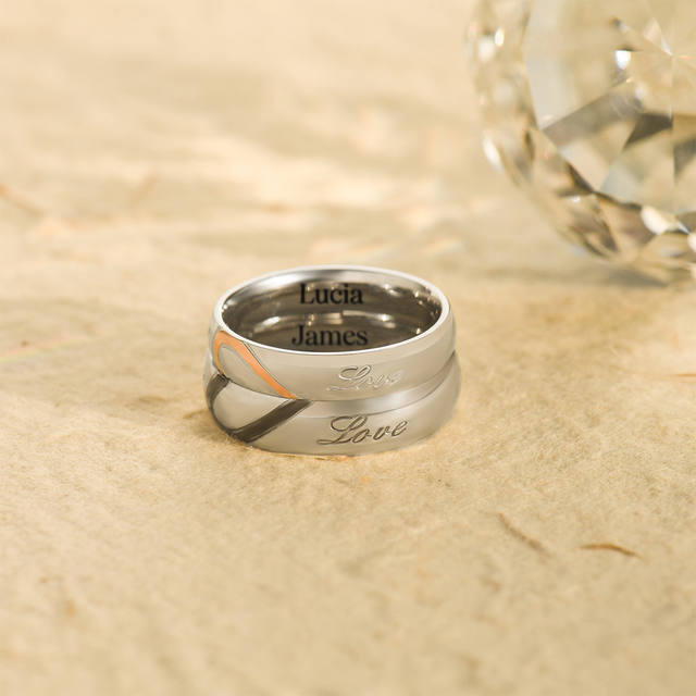 Half Heart Two Tone "Real Love" Ring for female and male on sand with crystal at the background