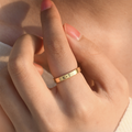 model wearing gold Custom Engraved Ring