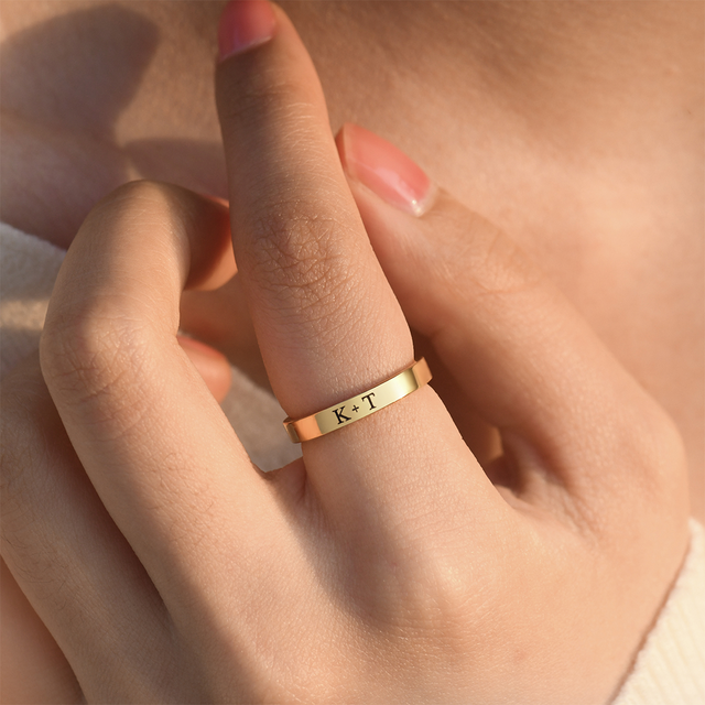 model wearing gold Custom Engraved Ring