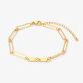 gold Multiple Name Link Bracelet on white background