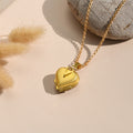 Photo Locket Necklace on plain canvas with stone and leaves on the side