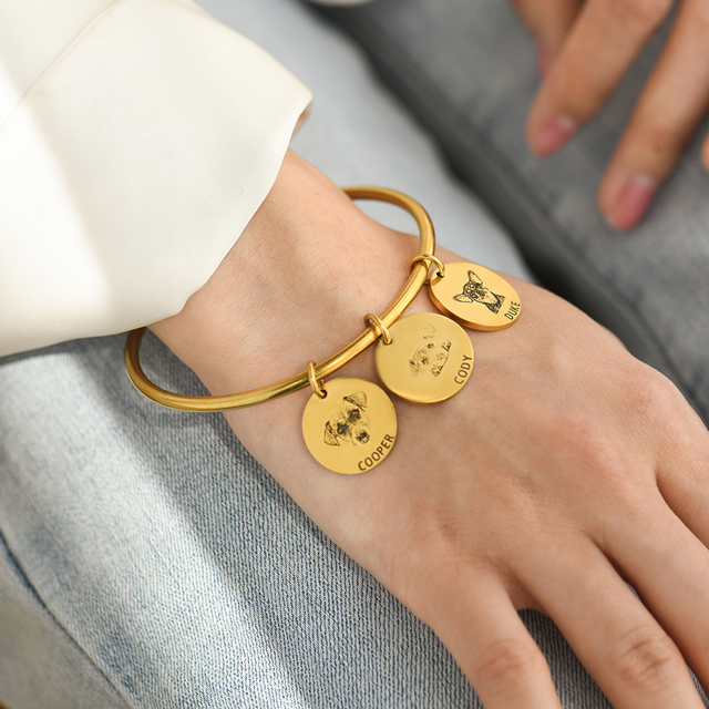 model wearing a gold Personalized Pet Portrait Name Cuff Bracelet