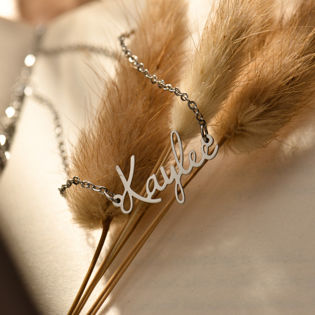 silver Kids Fairy Name Necklace on leaves