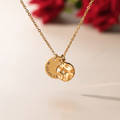 creative shot of the gold variant coordinate engraved compass necklace