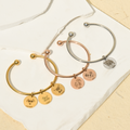 gold, rose gold, and silver on white canvas