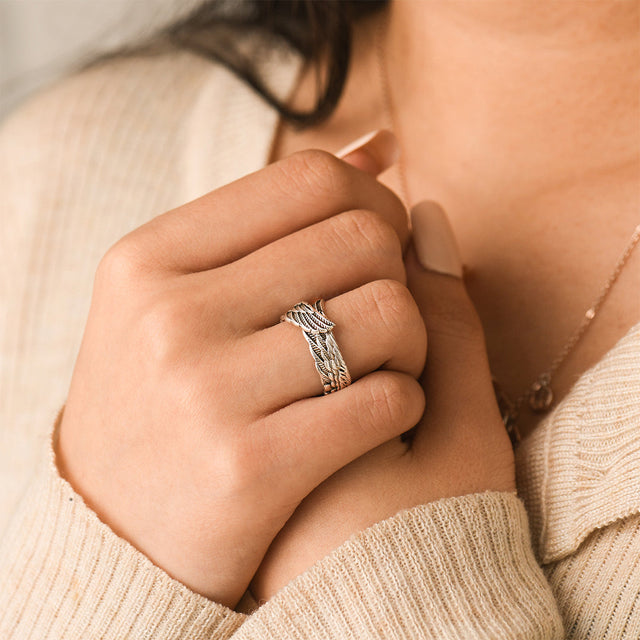 Model wearing the personalized Wing Ring