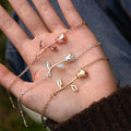 three variants of Beauty and the Beast Rose Initial Bracelet - rose gold, silver, gold