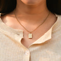 model wearing the Cross Locket Necklace