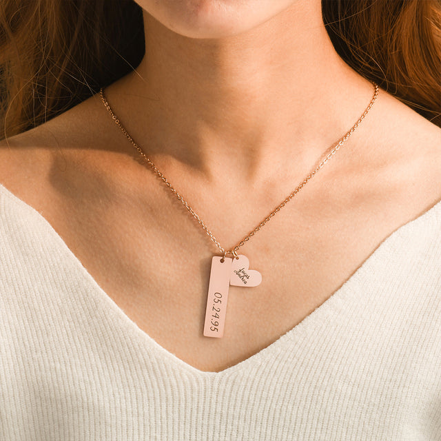 model wearing the rose gold variant of Custom Bar and Heart Necklace