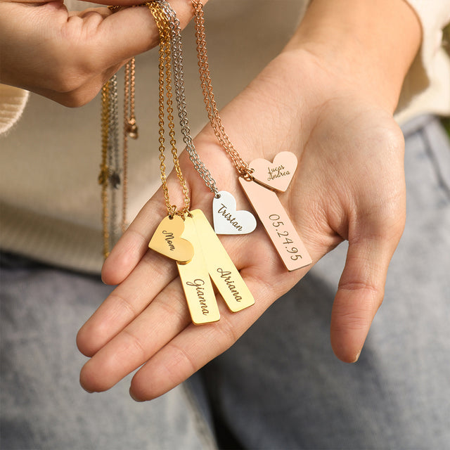 model showing the three Custom Bar and Heart Necklace in gold, silver and rose gold variants