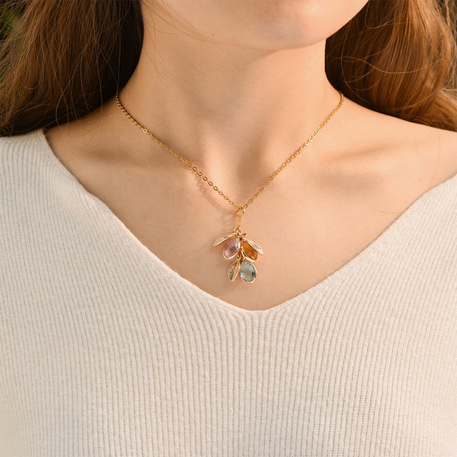 model wearing the Dangling Birthstone Initial Necklace