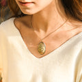 model wearing Double Heart Locket Necklace
