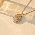 Double Heart Locket Necklace on plain canvas