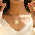 model holding Personalized Book Locket Necklace