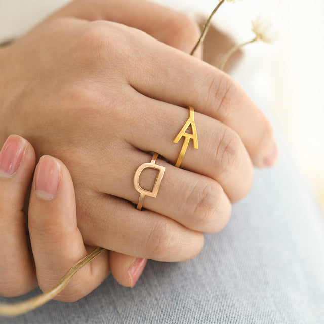 model wearing gold and rose gold Stackable Sideway Initial Rings