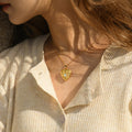 model wearing the gold Stone Heart Locket Necklace
