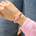 Model wearing To My Granddaughter, I Will Always Be With You Peach Blossom Knot Bracelet