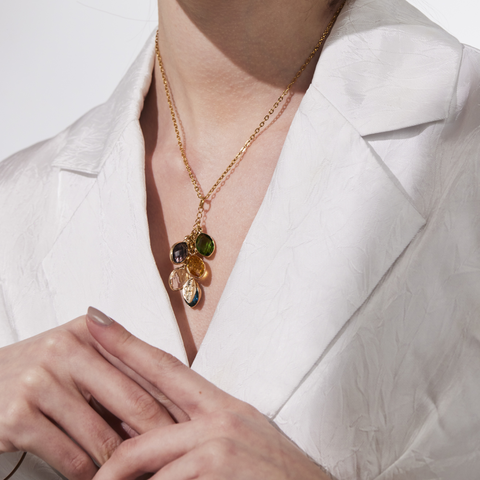 model wearing the Dangling Birthstone Initial Necklace