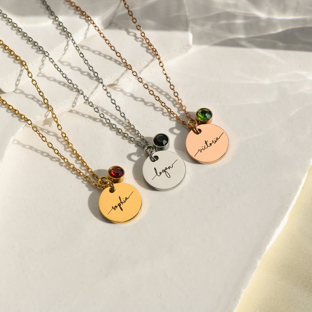creative image of gold, silver, and rose gold Monogram Script Birthstone Necklaces on a white canvas