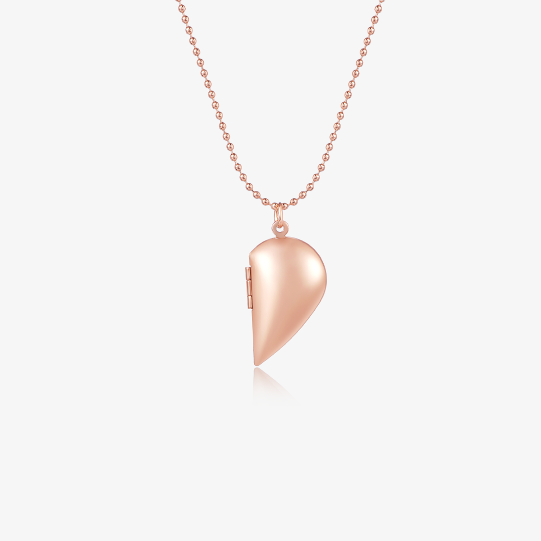 rose gold variant Couple's Heart Locket Necklace on a white background