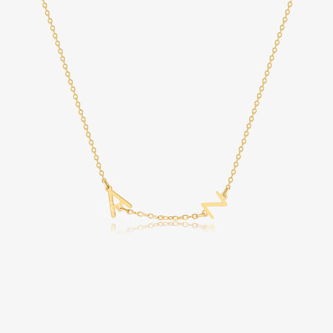 gold Minimalist Sideway Initial Necklace on white background