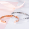 lifestyle shot of rose gold and silver colored Not Sisters By Blood, But Sisters By Heart Bracelets