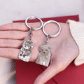 Custom Lifelike Pet Keychains of a cat and dog on model's palm