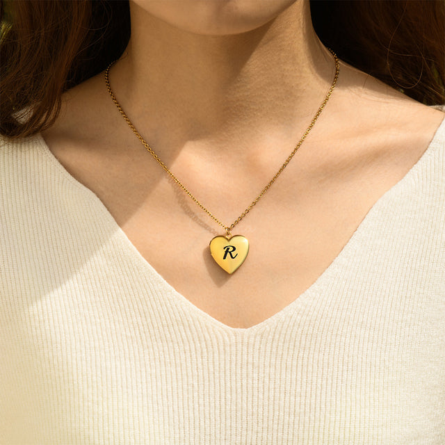 model wearing gold Initial Heart Locket Necklace