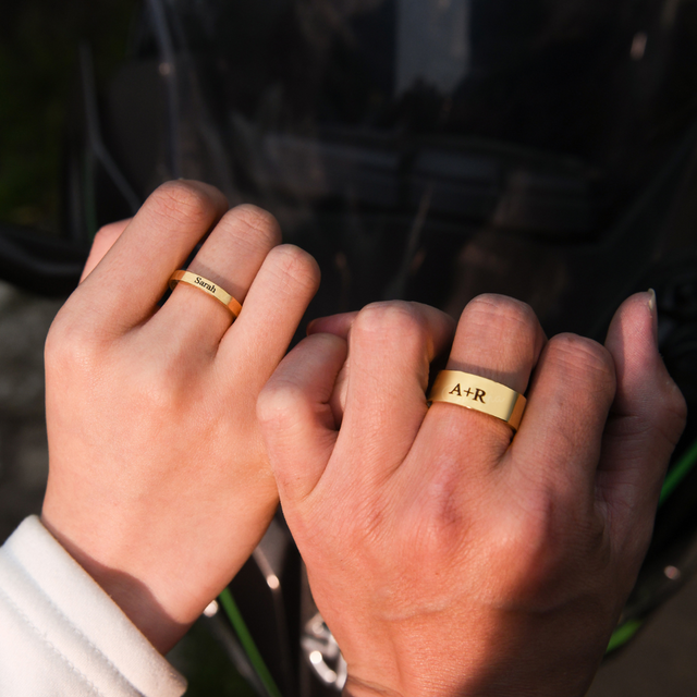 couple wearing the gold set of Personalized Initials Couple Ring