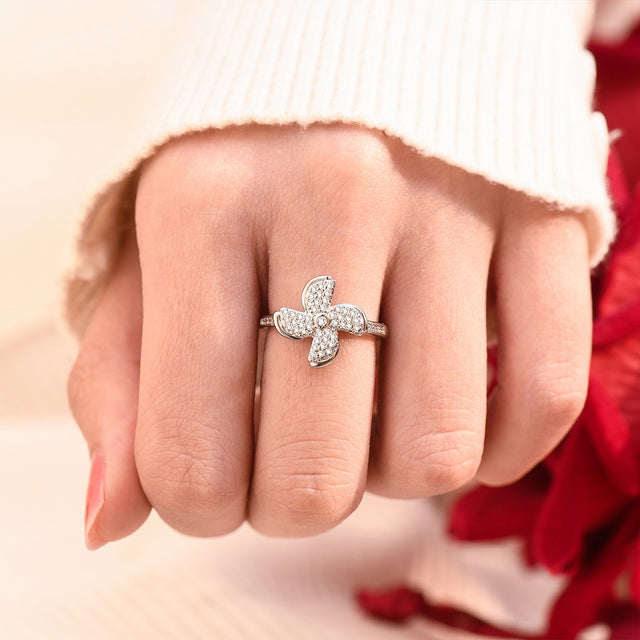 Female model wearing the Adjustable Windmill Fidget Ring