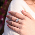 Female model wearing the Adjustable Windmill Fidget Ring