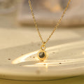 Lifestyle shot of Classic Photo Projection Necklace