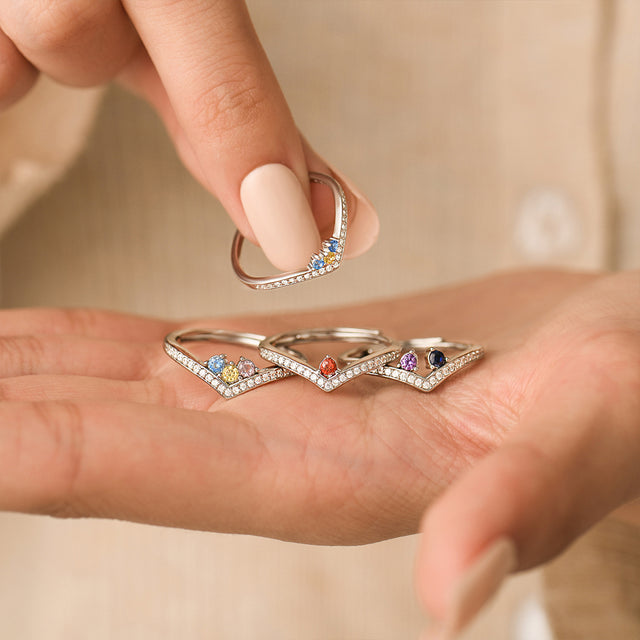 Personalized Birthstones Pave Rings on model's palm