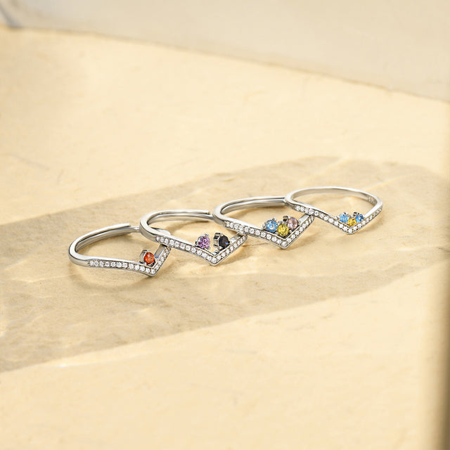 Personalized Birthstones Pave Rings on a canvas