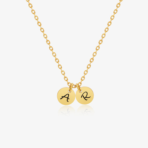 Dainty Initial Disc Necklace on white background