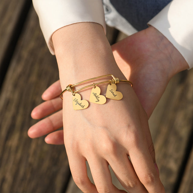 model wearing the gold Personalized Heart Name Bracelet