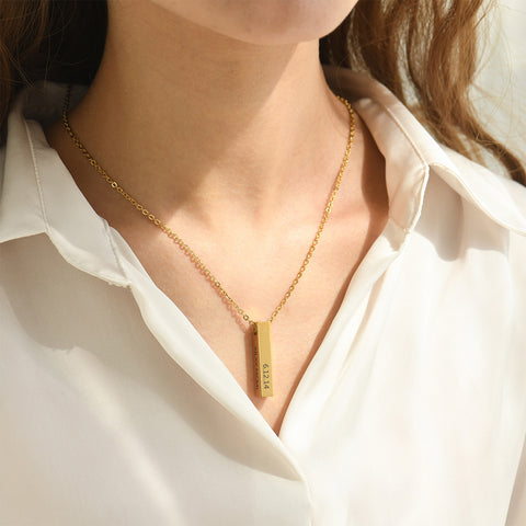 model wearing the Personalized Message Bar Necklace in gold variant