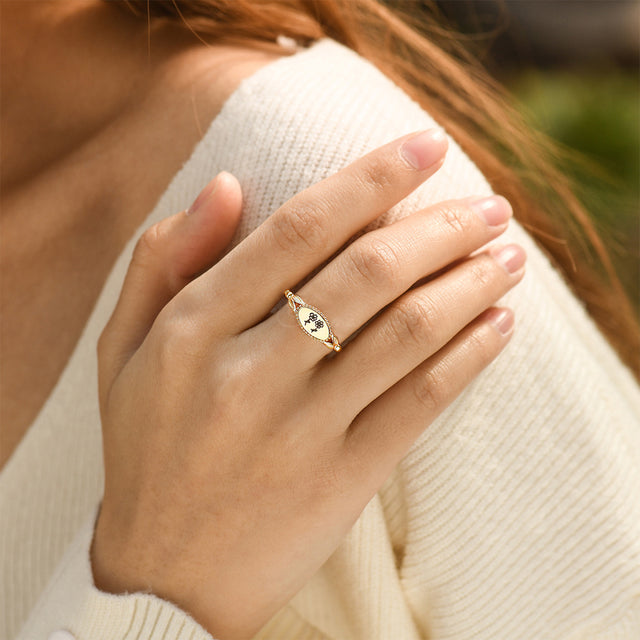 model wearing Personalized Multiple Birth Month Flower Ring in gold