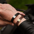 model wearing black and brown Personalized Name Leather Bracelets