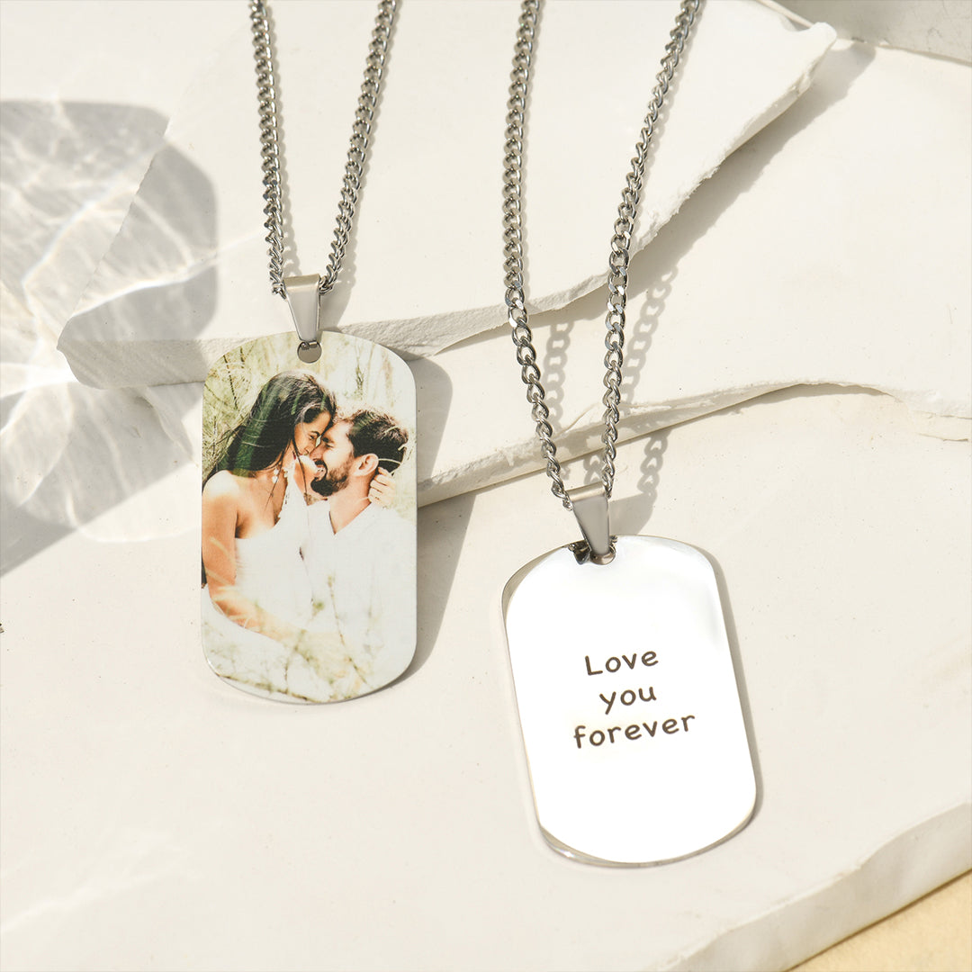 front and back of Personalized Photo Engraving Necklace on flat white stone pieces
