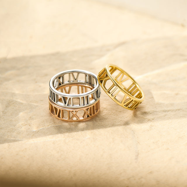 gold, silver, and rose gold variants Personalized Roman Numerals Rings stack together