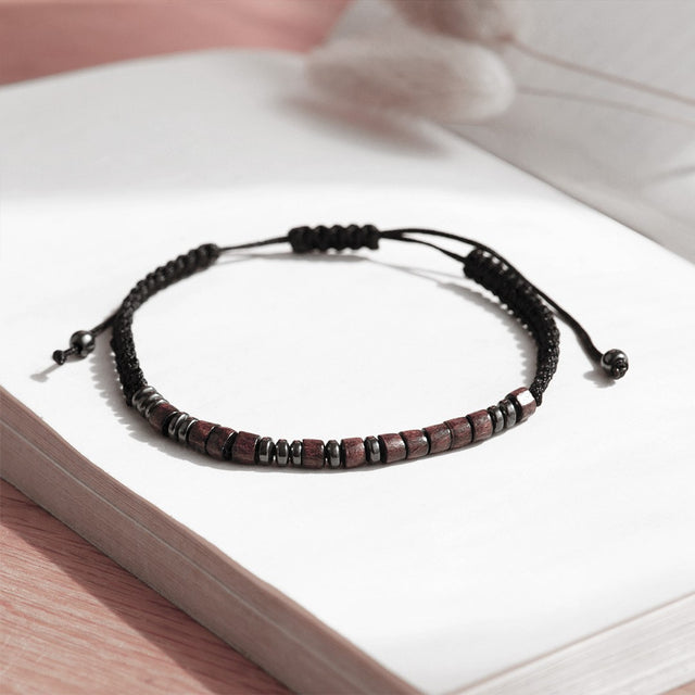 To My Son, I Love You Morse Code Bracelet on top of an open book