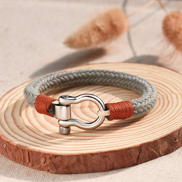 To My Son, I Will Always Be With You Omega Gray Nautical Bracelet on a piece of wood