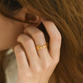 model wearing gold Stackable Dainty Name Ring