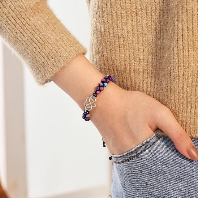 female model in brown knitted long sleeves and jeans wearing the To My Daughter, Always In My Heart Beads Bracelet