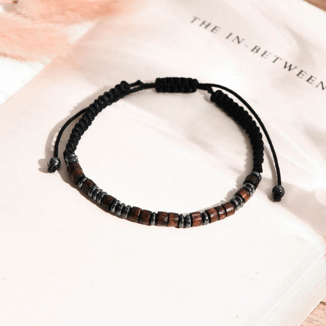 Photo of morse code bracelet on top of a book