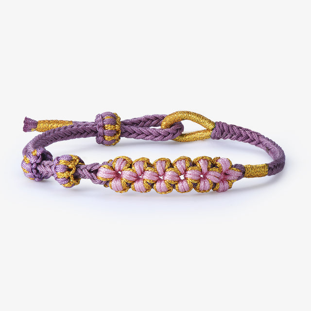 Purple variant of Blossom Knot Bracelet in white background