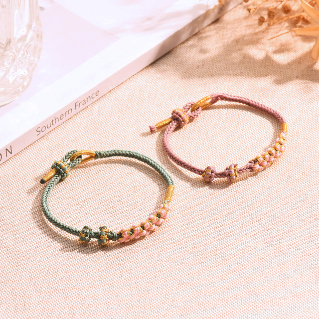 Creative shot for Blossom Knot Bracelet with Purple and Green variants