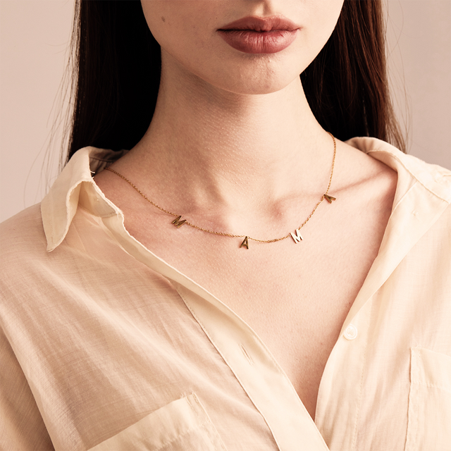 Model wearing MAMA Necklace