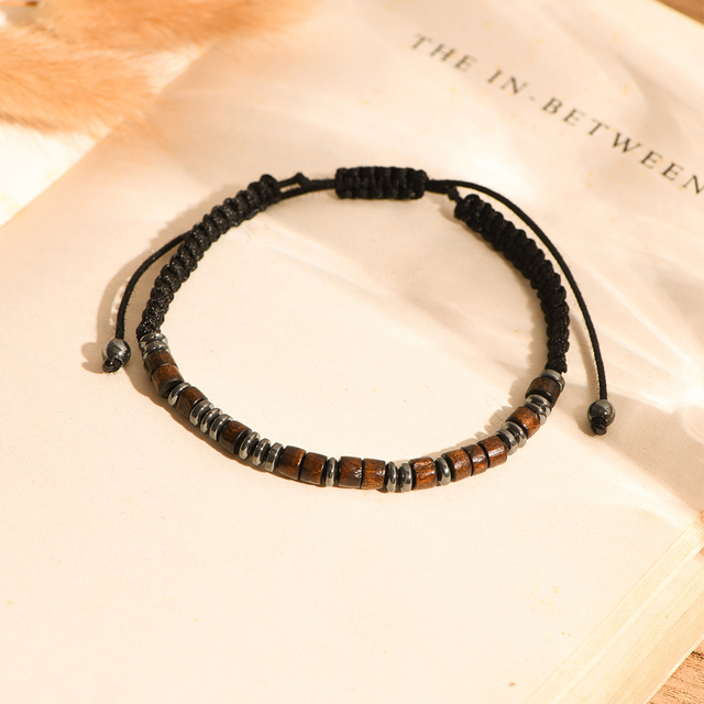 Morse Code Bracelet on a page of an open book